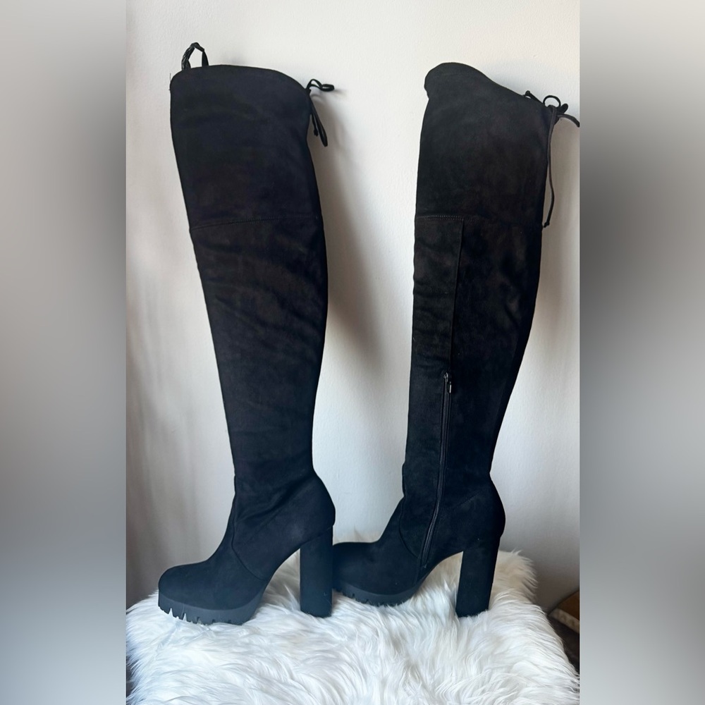 Over the knee or mid-thigh boots.